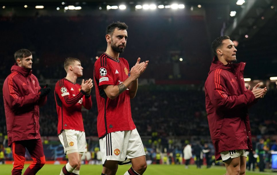 Manchester United players thank their fans after losing their final Champions League group stage match against Bayern Munich. Source: Imago Images